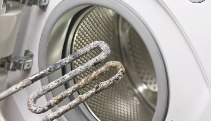 Неприятный запах в стиральной машине_лучшие способы избавления - Нагревательный элемент с накипью